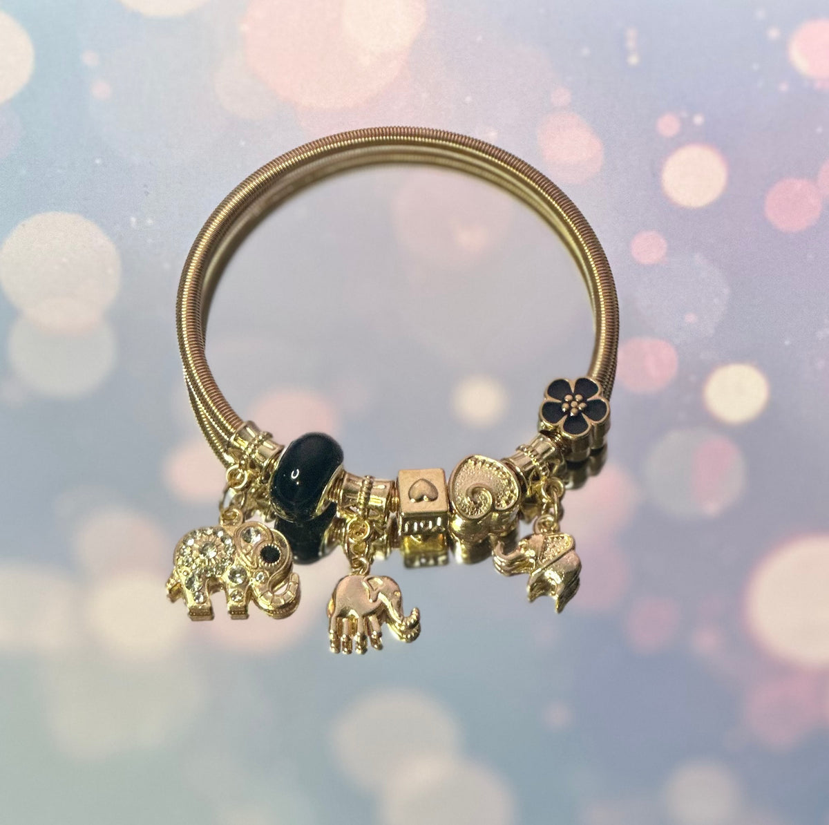 C-Gold plated elastic bracelet with black beads charms