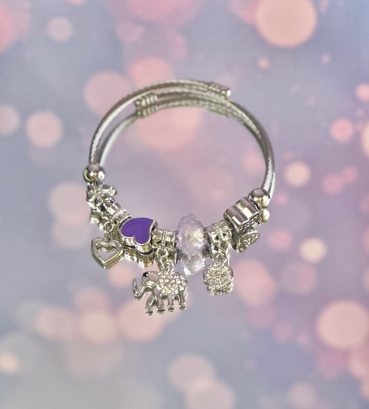 A-Silver cuff bracelet with Purple Heart and charms